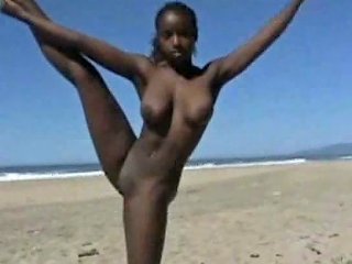 Busty Ebony Amateur Hottie On The Beach Doing Acrobatic Tricks